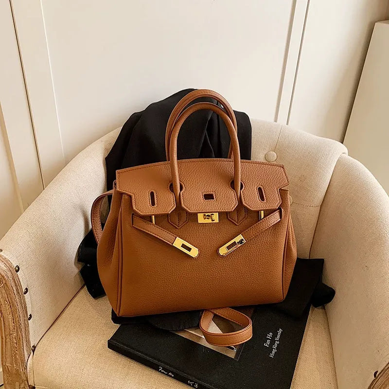 Kalonbd Togo Platinum Handbag-Brown